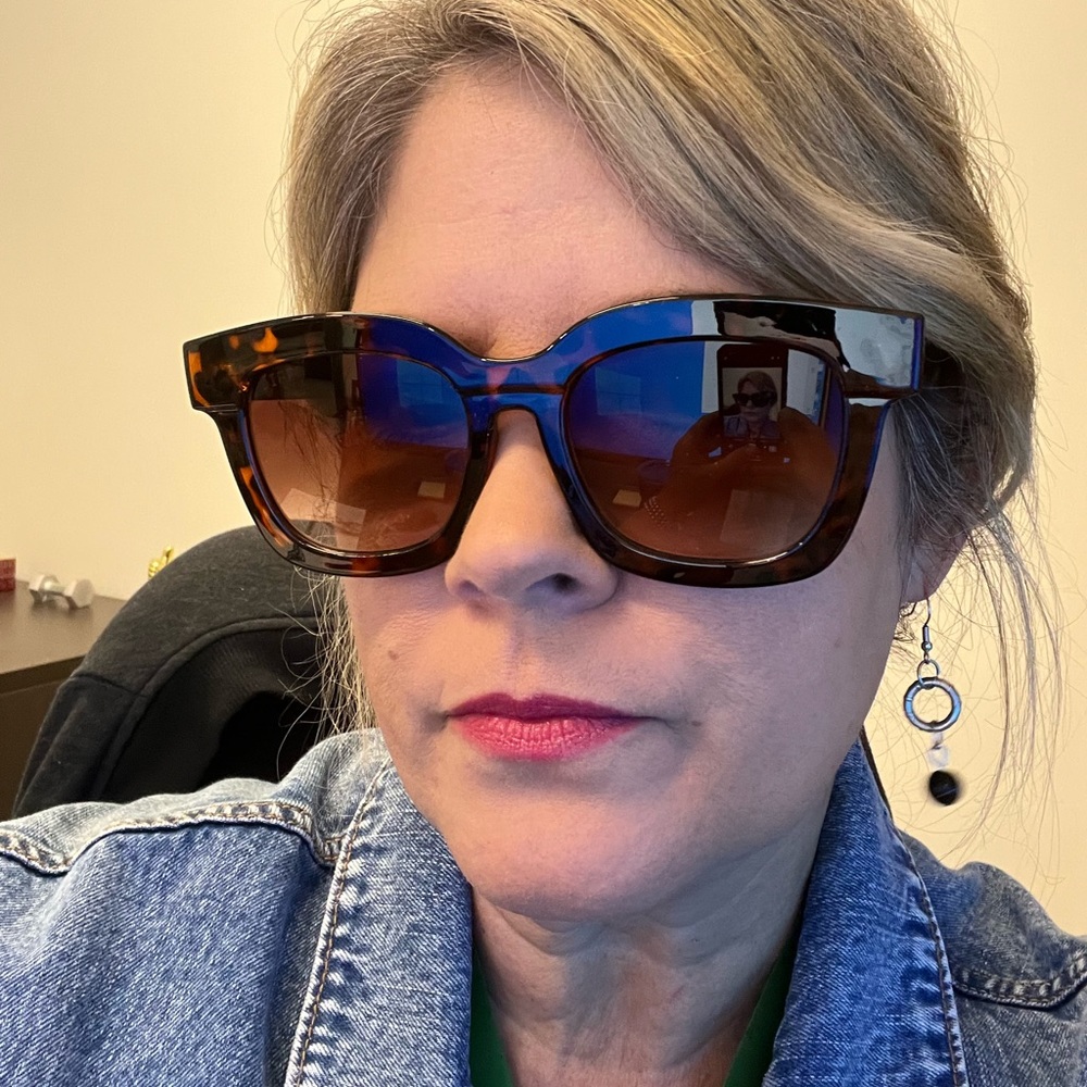 Brown DIFF sunglasses.